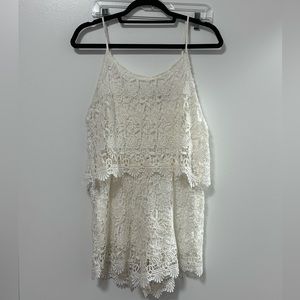 White lace romper, button detail on back size medium